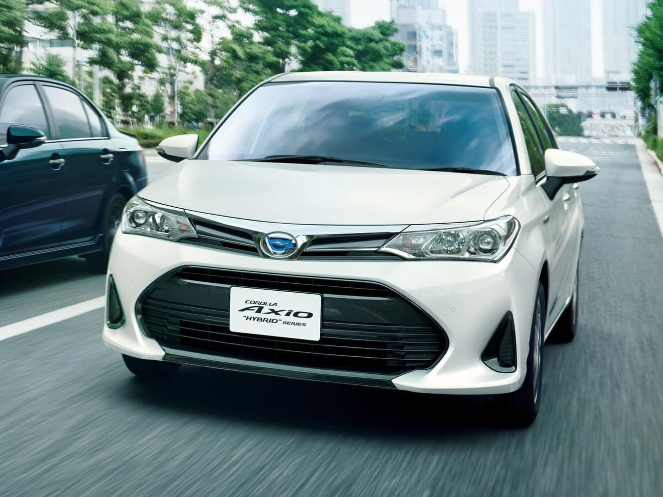 Toyota Corolla XI (E160, E170) Рестайлинг 2 Седан Axio, фото 3